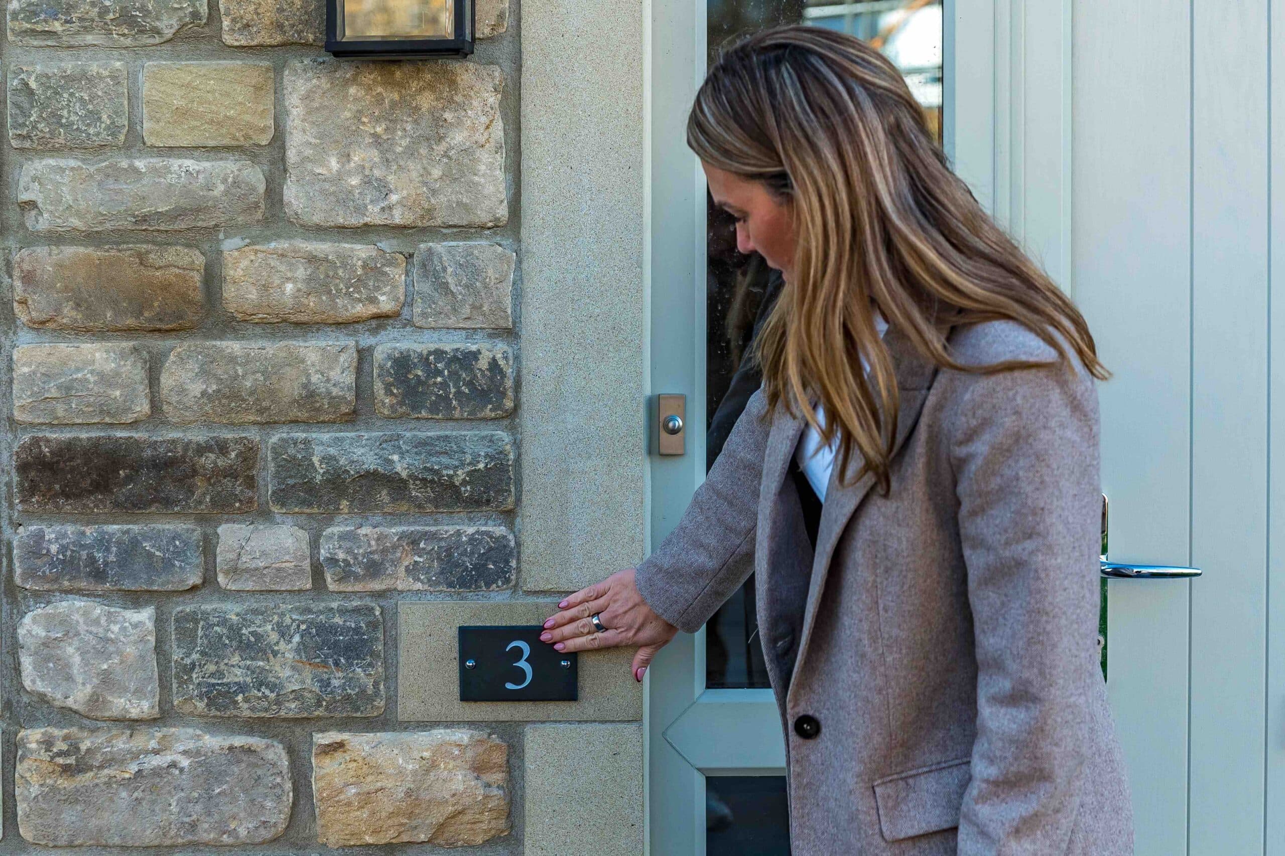 Sarah, MD, Viewing our slate signs at Pendle Farm Worsthorne